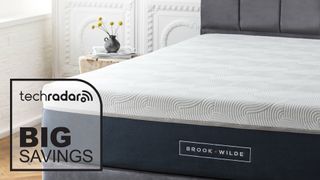 Brook + Wilde The Ultima mattress in a bedroom with a deals graphic