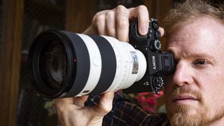 Sony FE 50-150mm F2 GM lens attached to a Sony A9 III, bieng held up to photographer's eye
