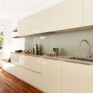Kitchen with white cabinet and wash basin
