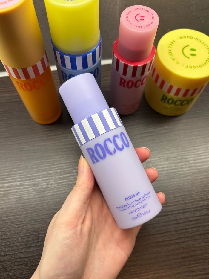 Deputy beauty editor Grace Lindsay holding the Rocco Triple Up Hydrating 3-in-1 Toner &amp;amp; Primer