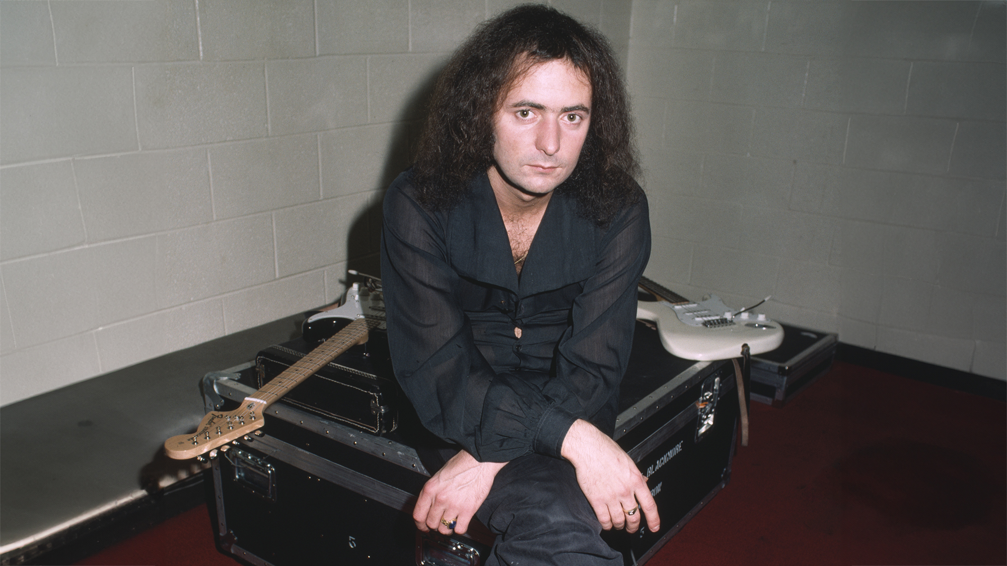 English rock guitarist and songwriter Ritchie Blackmore, of rock group Rainbow, backstage at the Forum in Montreal, Canada, 10th November 1975.