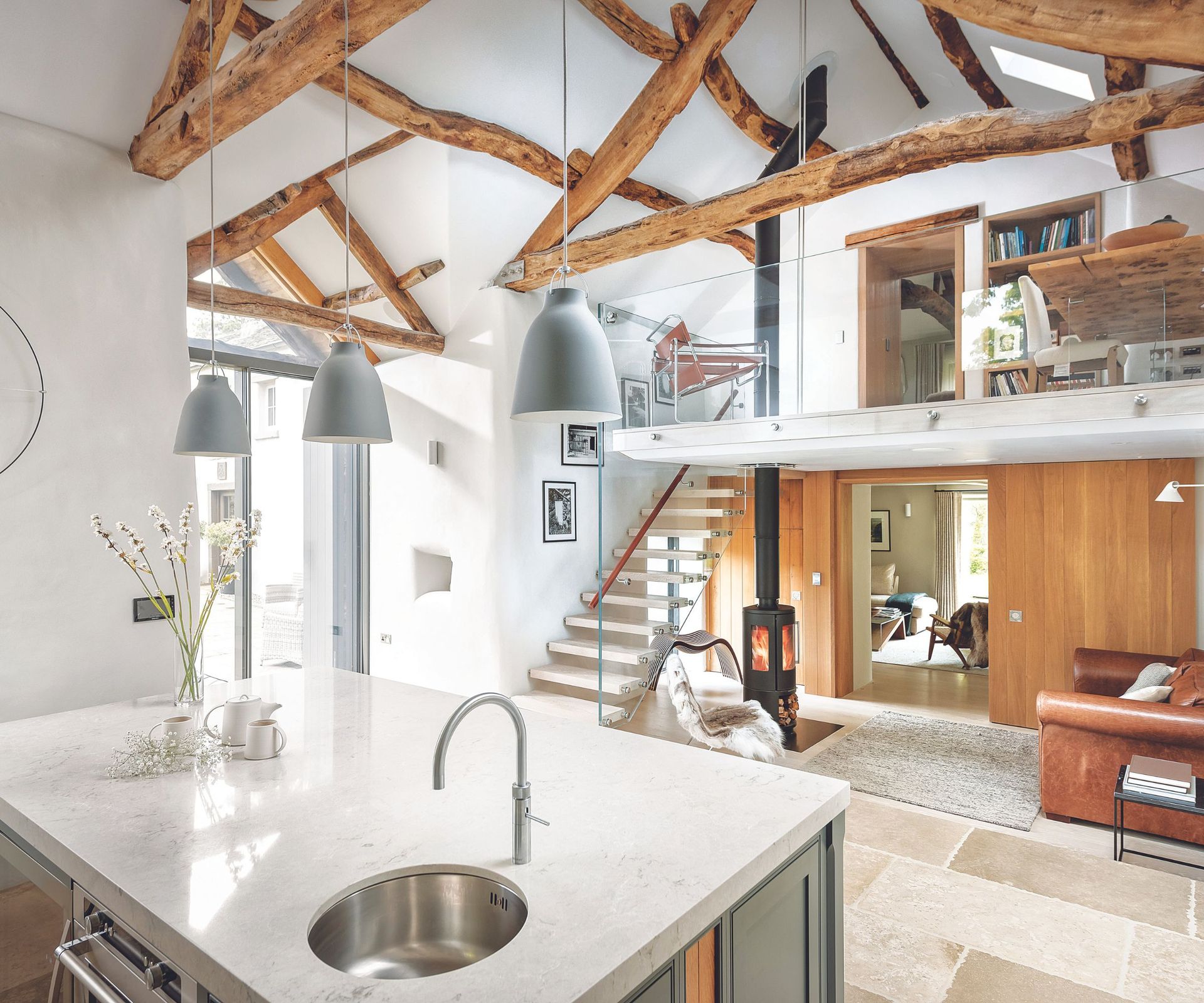 Kitchen island, wooden walls, furnace, glass balcony