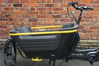 This image shows the front tub and steering strut of the Raleigh Stride 2 e-cargo bike