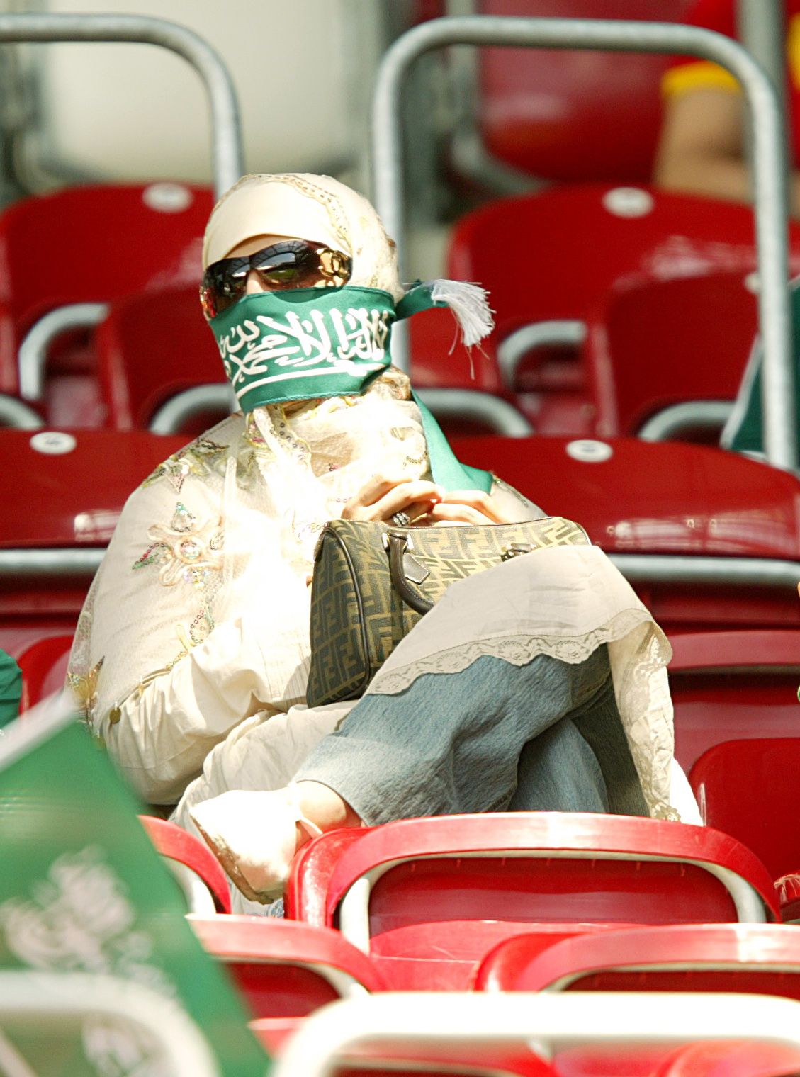 Saudi Arabian woman watching sport