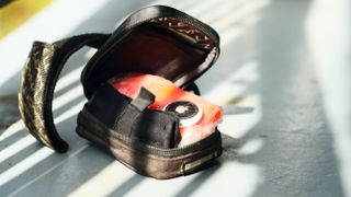 An Apple AirTags in a bike saddle bag