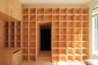 Empty record shelves at EDC Studio, designed by Fairfax in Paris