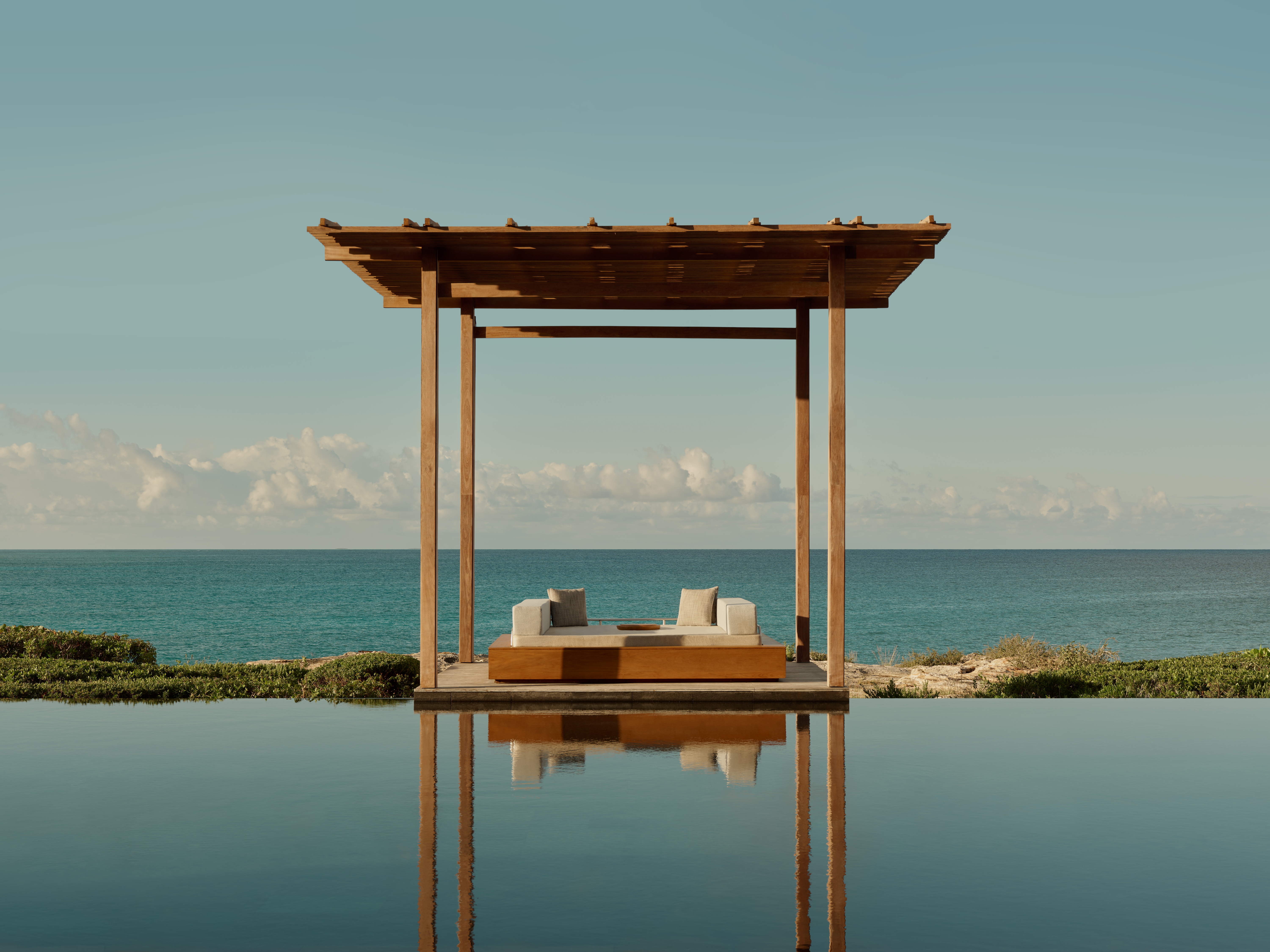 The pool at Amanyara with the ocean in the background