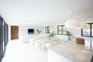 Studio with white walls and white floor