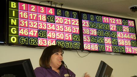 A woman announcing modern bingo calls