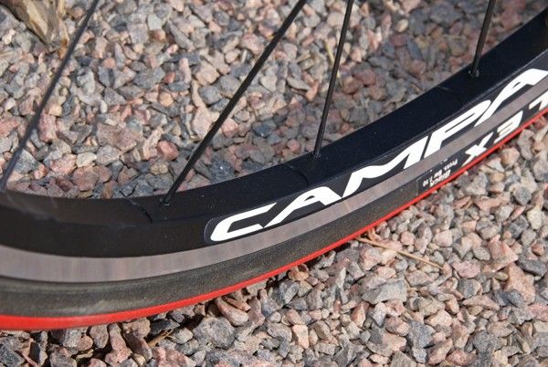 Both rims are milled in between the spoke holes to shave a few grams.