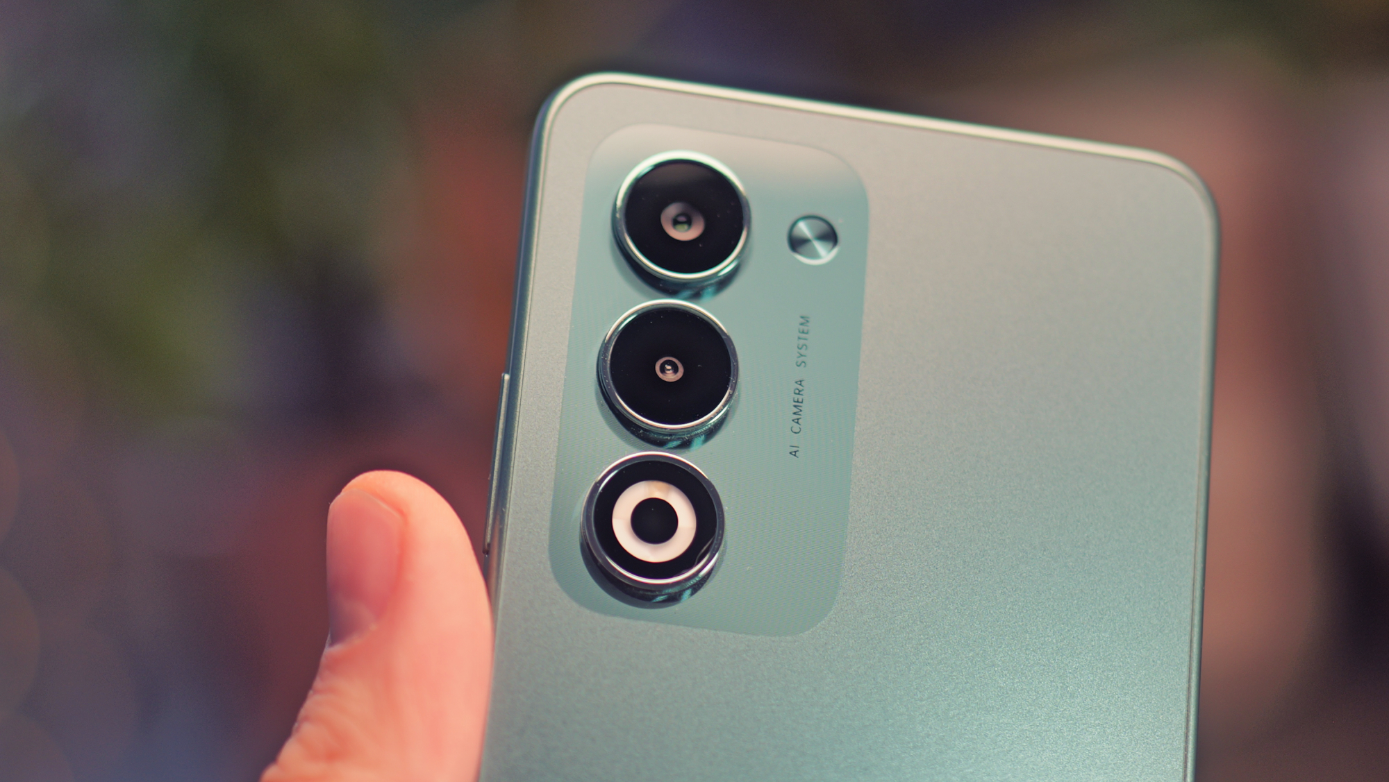 Oppo A5 5G phone held in a hand
