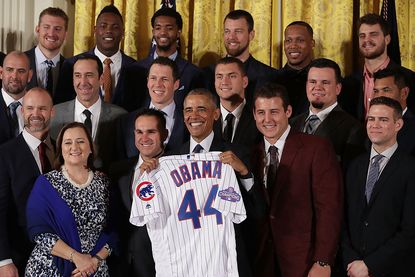 Barack Obama and Chicago Cubs players.