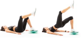 A woman demonstrates how to do a glute bridge balance board exercise