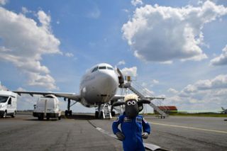 Shaun the Sheep gets ready to board the Airbus A310 "zero-g" aircraft for a parabolic flight to simulate the effects of microgravity.