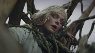 Thia's eyes rolling back in her head to reveal she's a Weyland-Yutani synthetic android in Predator: Badlands