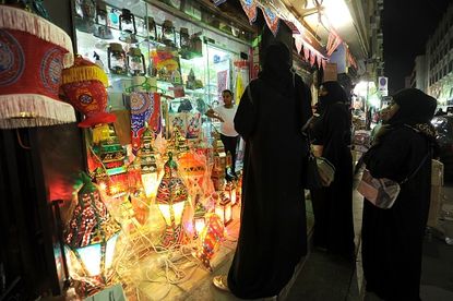 Saudi women shop for Fanous.