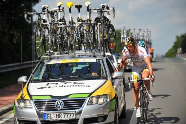 White jersey wearer Tony Martin gets some advice from the HTC-Columbia team car.
