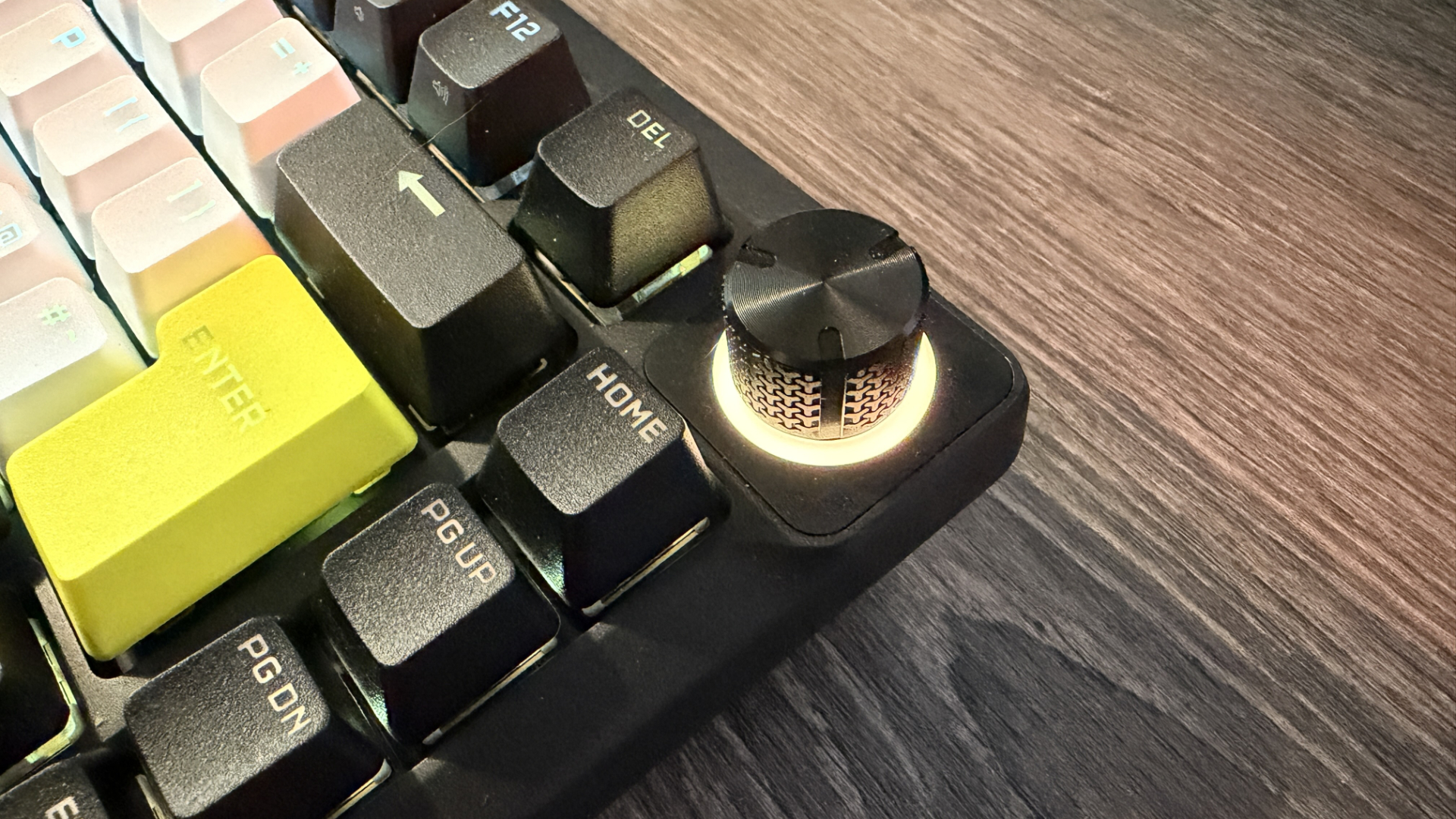 Corsair Makr Pro 75 gaming keyboard on a wooden desk