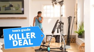 Woman using Bowflex gym at home