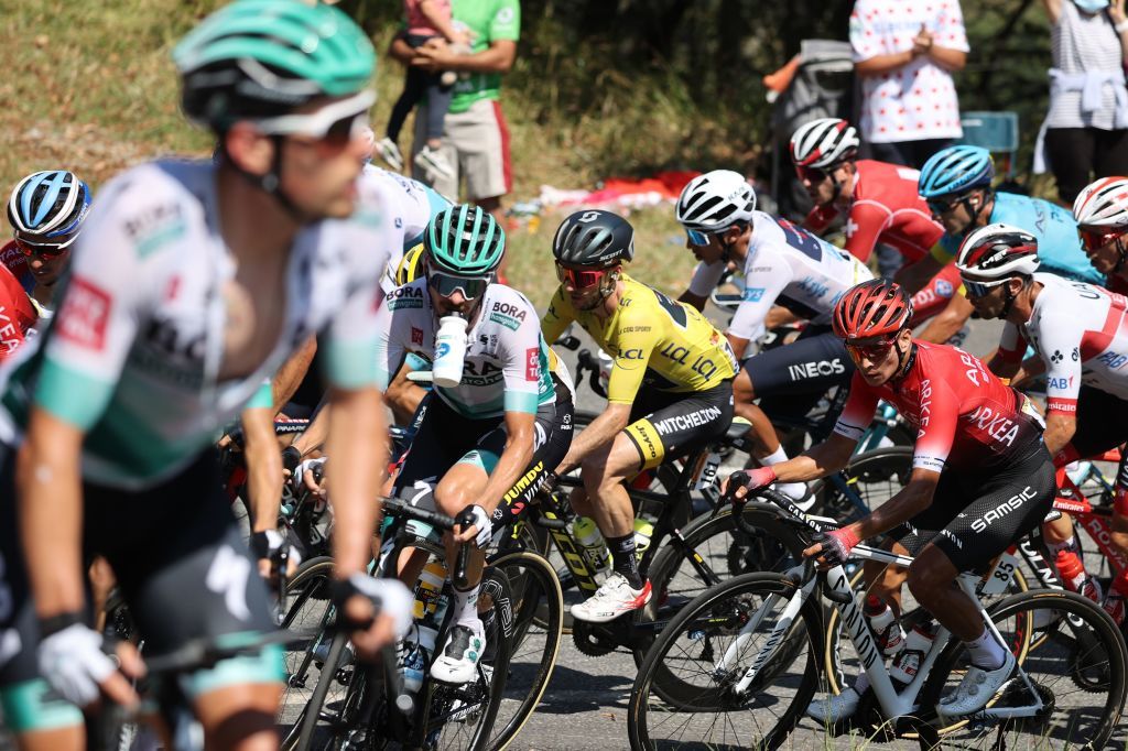 Team Mitchelton rider Great Britains Adam Yates wearing the overall leaders yellow jersey rides in the pack during the 8th stage of the 107th edition of the Tour de France cycling race 140 km between CazeressurGaronne and Loudenvielle on September 5 2020 Photo by KENZO TRIBOUILLARD AFP Photo by KENZO TRIBOUILLARDAFP via Getty Images