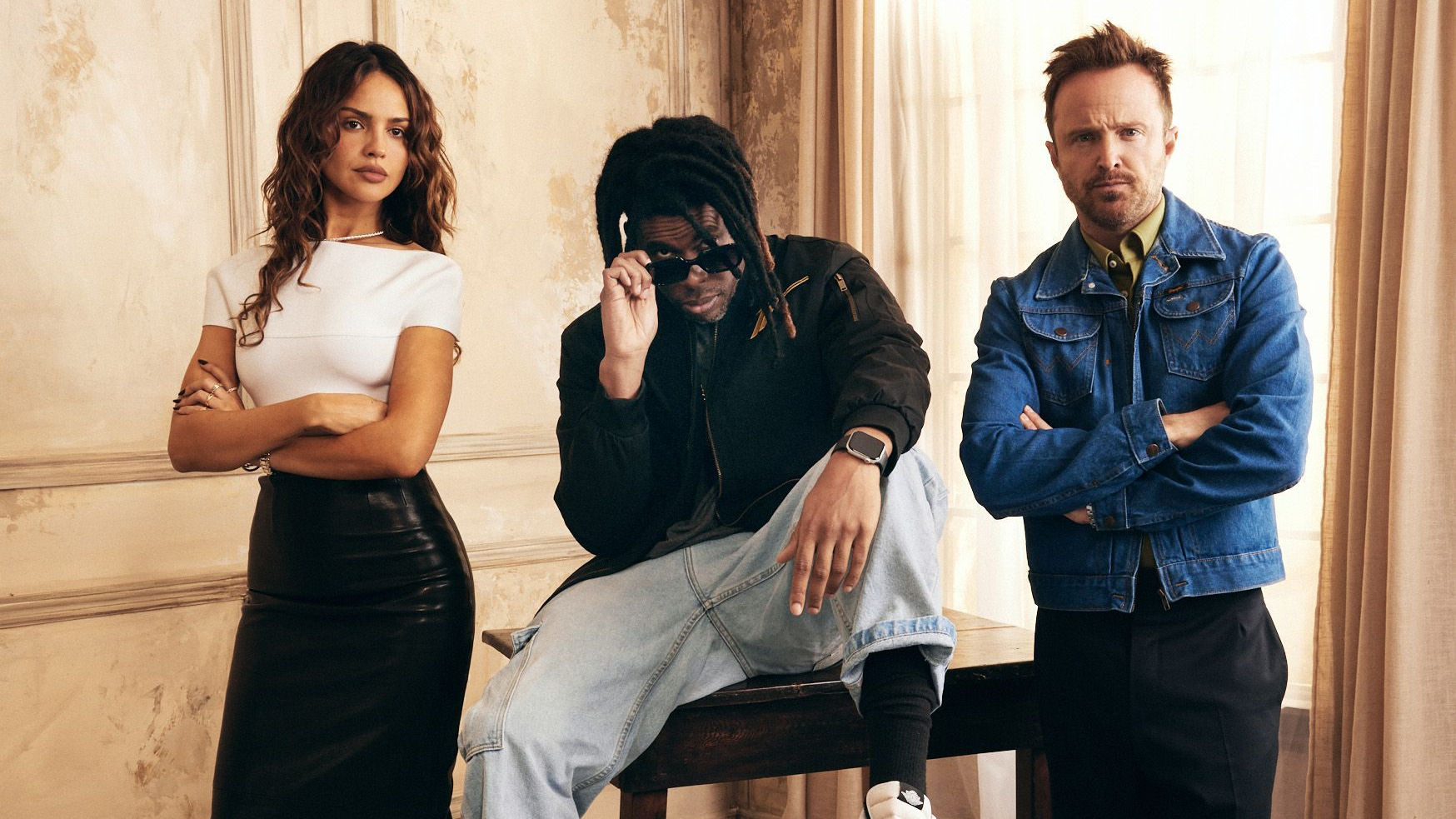Eiza González, Flying Lotus and Aaron Paul pose in the Getty Images Portrait Studio Presented by IMDb and IMDbPro at SXSW 2025 on March 09, 2025 in Austin, Texas.