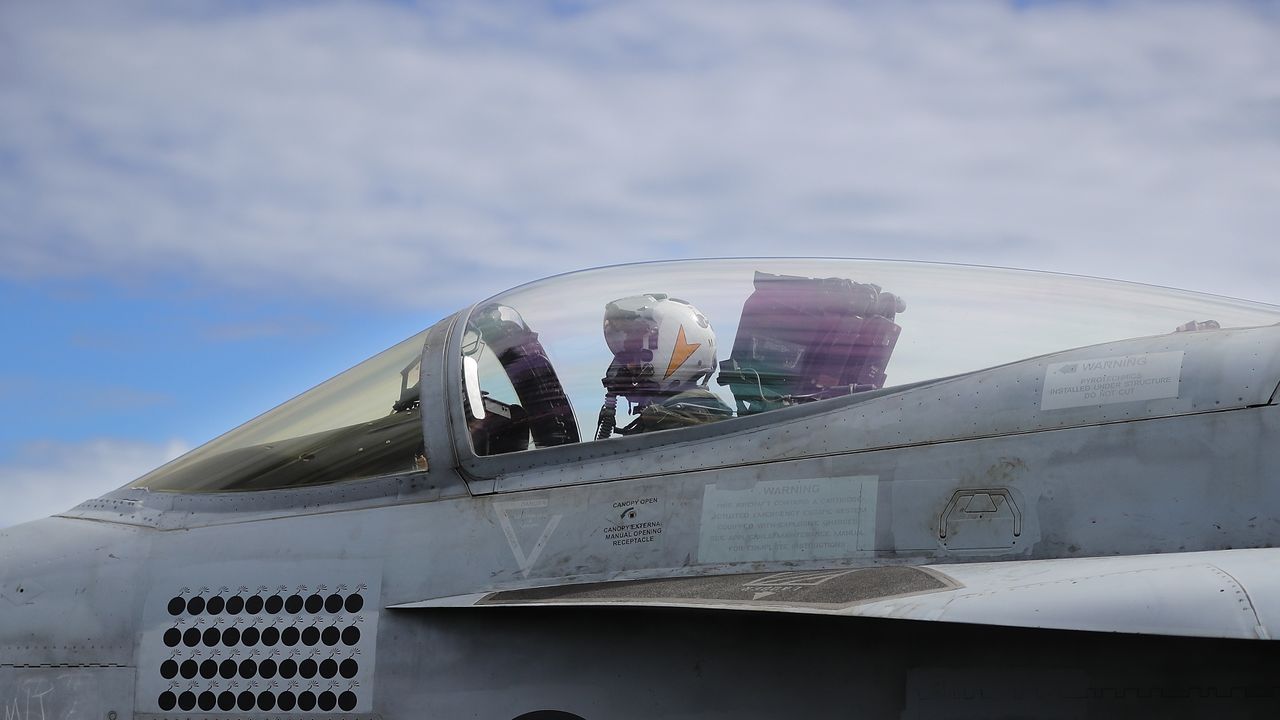 A US navy pilot prepares to take off from the USS George H. W. Bush 