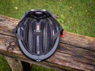 Julbo Sprint aero helmet on a wooden beam