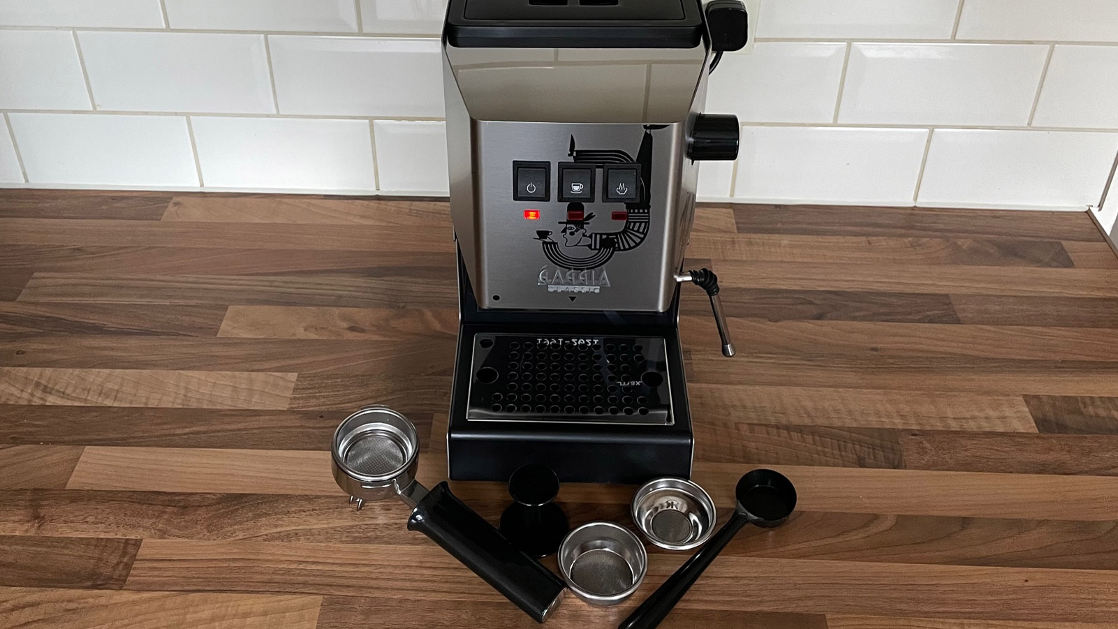 The Gaggia Classic and its accessories on a kitchen countertop