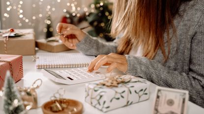 Woman budgeting holiday personal finances