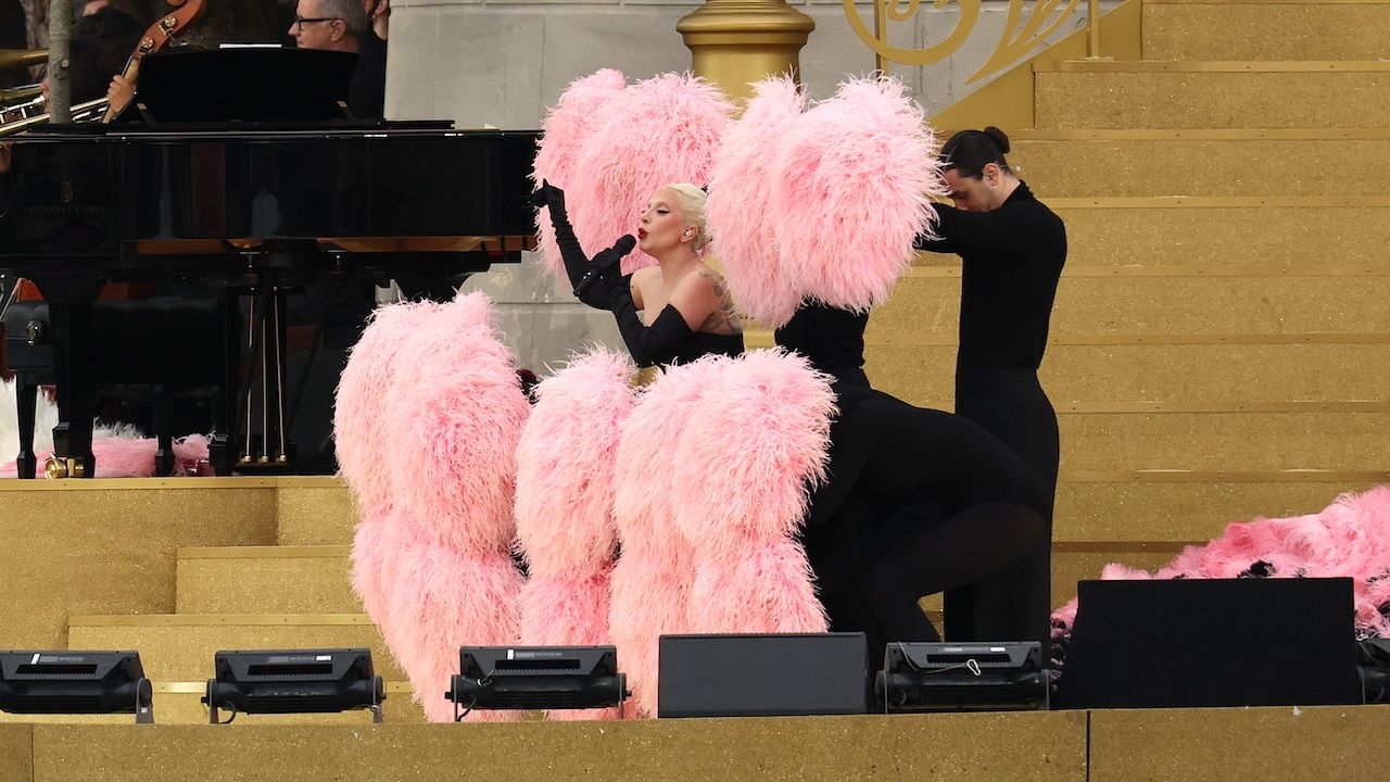 Lady Gaga in a pink and black feathered ensemble at the 2024 Olympics Opening Ceremony rehearsals in Paris July 2024