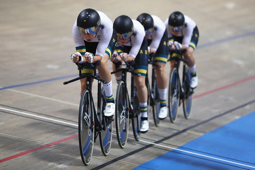 Alexandra Manly, Annette Edmondson, Ashlee Ankudinoff, Georgia Baker and Amy Cure of Australia on their way to winning the gold medal in the Women's Team Pursuit Final
