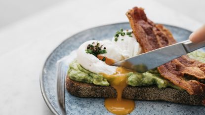 Poached eggs with avocado for breakfast