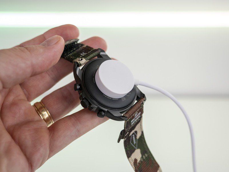 Fossil Gen 6 Charging Puck Attached