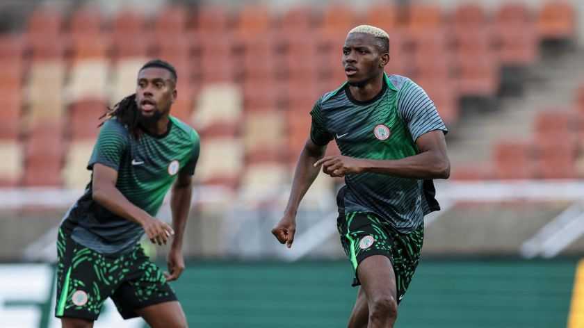 Nigeria&#039;s forward #9 Victor Osimhen (R) Nigeria&#039;s midfielder #17 Alex Iwobi (L) warm up ahead of the FIFA World Cup 2026 Africa qualifiers group C match between Lesotho and Nigeria at the Peter Mokaba Stadium in Polokwane on October 10, 2025. 