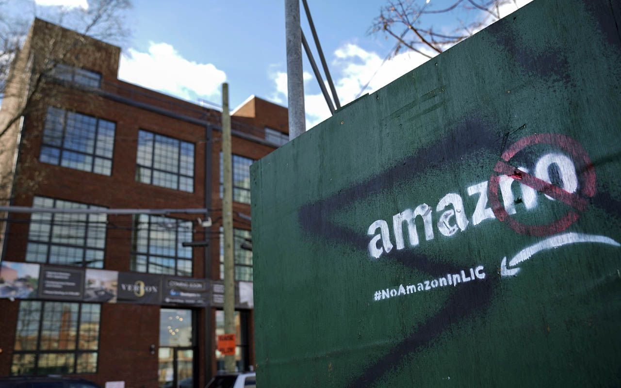 NEW YORK, NY - JANUARY 9: A protest message directed at Amazon is spray painted on a wall near a construction site January 9, 2019 in the Long Island City neighborhood of the Queens borough o