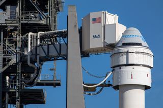 Boeing’s CST-100 Starliner spacecraft sits atop its Atlas V rocket at Cape Canaveral Air Force Station’s Space Launch Complex 41 in Florida, on Dec. 5, 2019, ahead of the program’s first-ever Integrated Day of Launch Test on Dec. 6. For this test, the rocket’s booster and Centaur upper stage were filled with propellants for a full run-through of the launch countdown. 