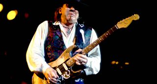 Stevie Ray Vaughan gurns as he solos on his number one Stratocaster