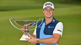 Viktor Hovland with the FedEx Cup trophy