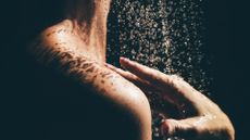 close up of woman showering