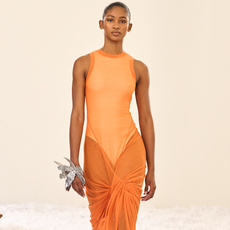 Photos from the Spring Summer 2026 runway showcasing orange color trend.