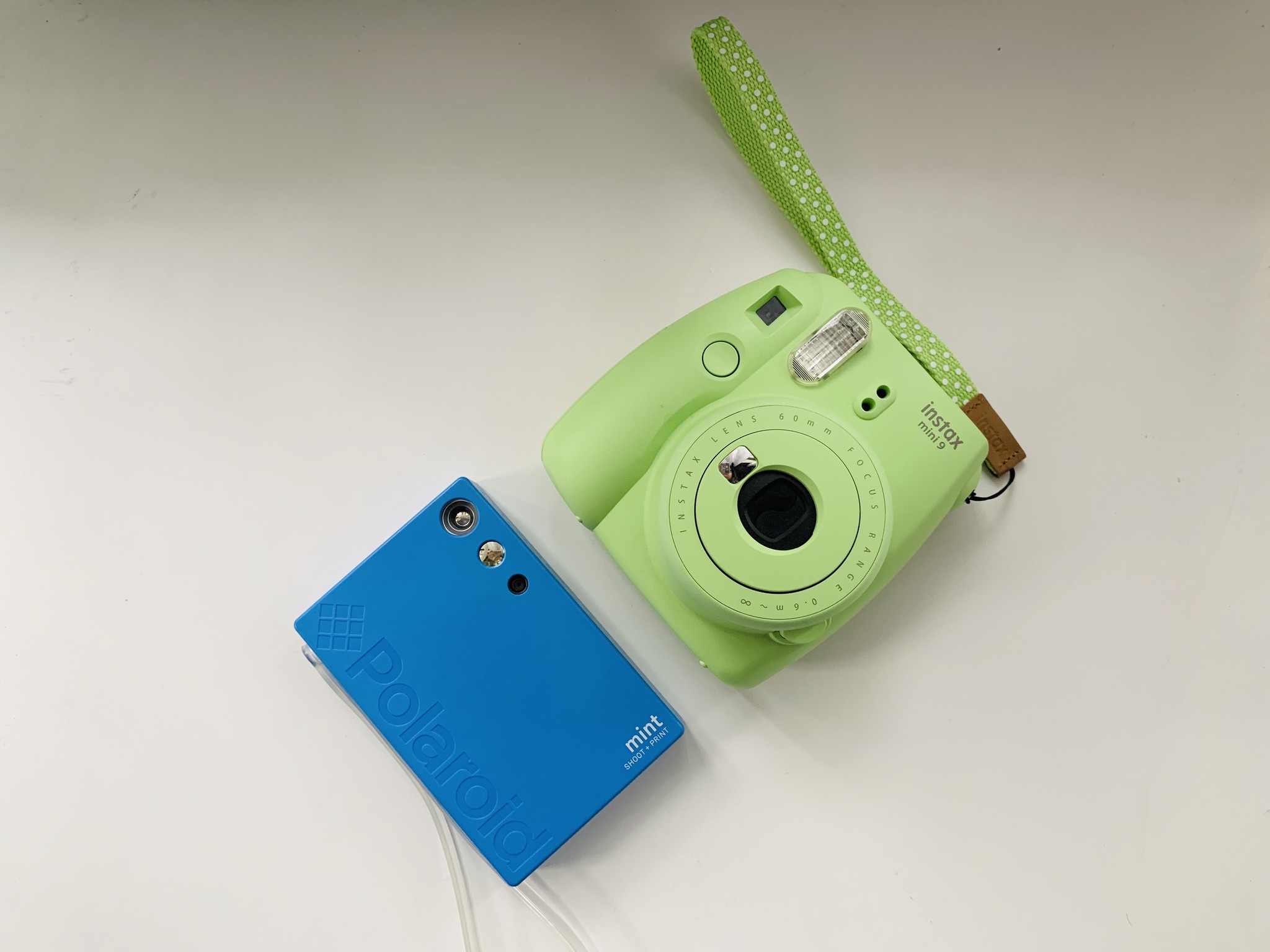 mint green polaroid instant camera