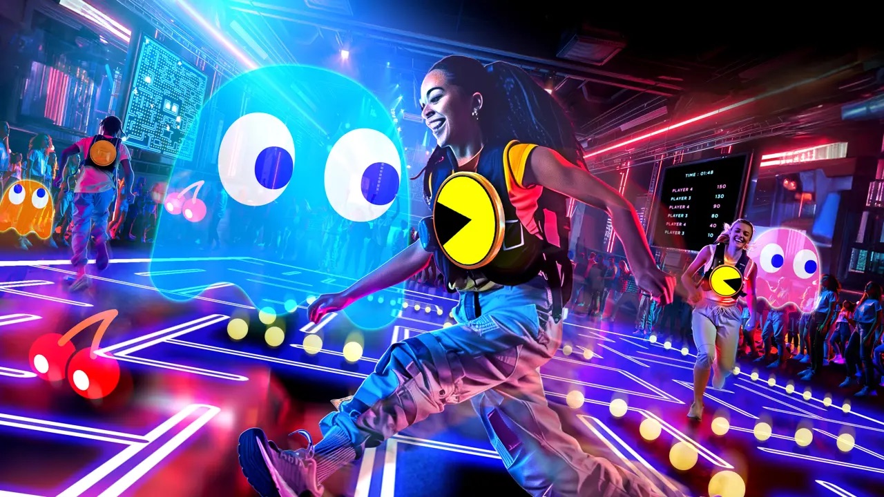 Pac man live - a person running from Pac Man ghosts