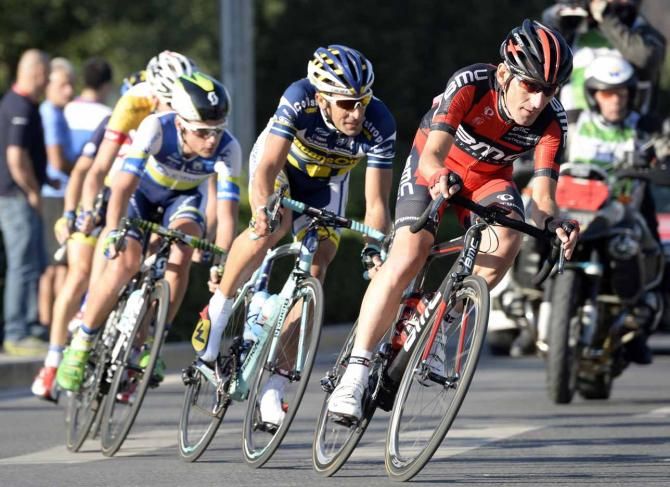 Marco Pinotti and Juan Antonio Flecha marked their final day in the peloton by going on the attack.