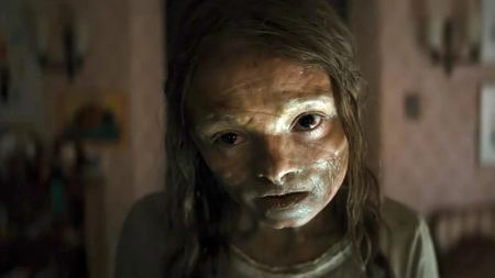 Screenshot from Lee Cronin's The Mummy trailer featuring a young girl that appears undead.