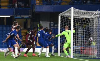 Antonio Rudiger, second right, scores Chelsea's first goal