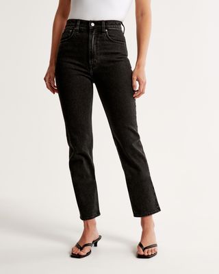 Abercrombie & Fitch model in ankle length black jeans