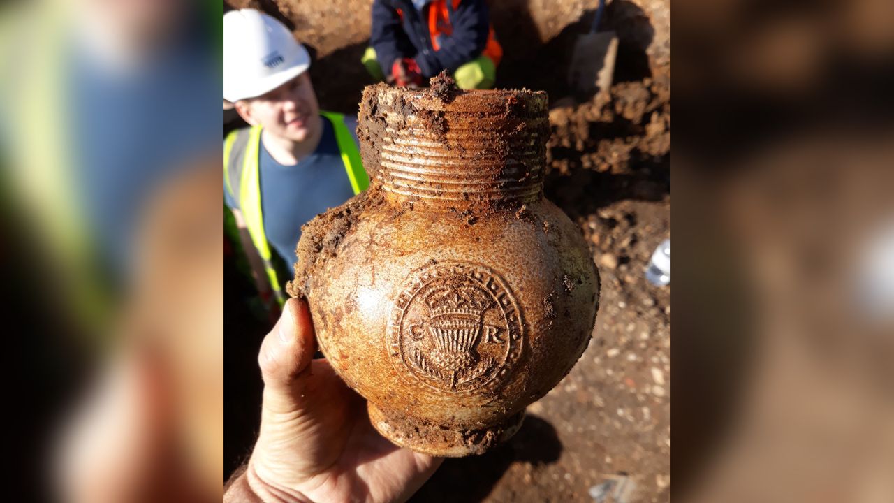 This 17th century mug with a Royalist medallion of King Charles II shows that the inn at the site continued in use long after the theater.