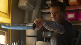 Clint Barton (Jeremy Renner) raises his sword in Hawkeye