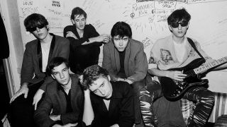 Portrait of British group the Psychedelic Furs as they pose backstage at Tuts, Chicago Illinois, October 8, 1980. Pictured are, from left, Tim Butler, Roger Morris (fore), Vince Ely (rear), Richard Butler (fore), Duncan Kilburn (rear), and John Ashton. (Photo by Paul Natkin/Getty Images)