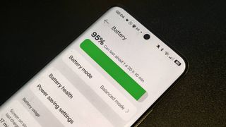A battery-saving setting shown on a Realme GT5 Pro.
